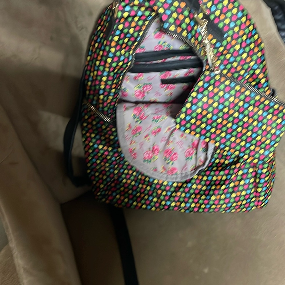 Betsy Johnson Heart on my sleeve backpack.